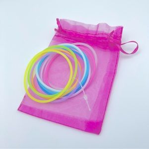 NEW 80s Silicone Rubber Bracelets Pack of 10 Pastel Colored Glow Bands